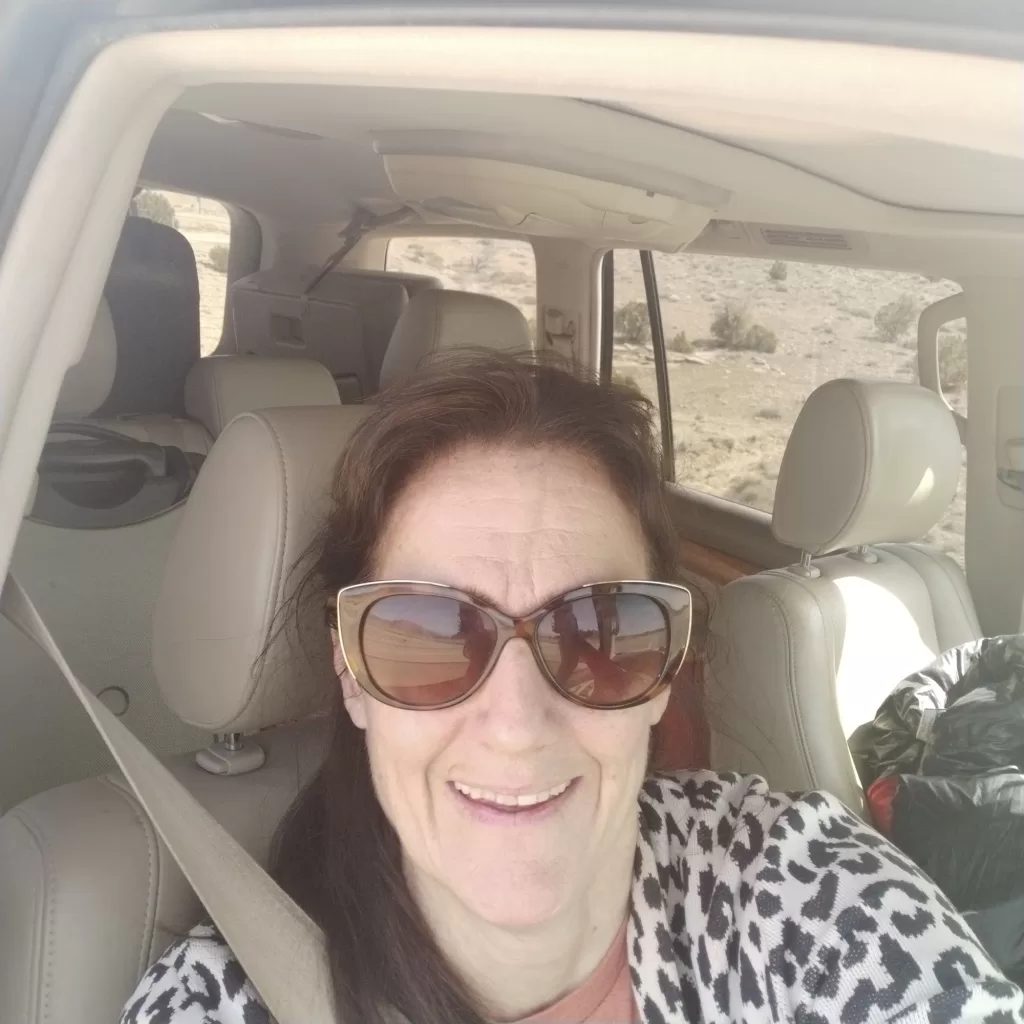 smiling pic in the car