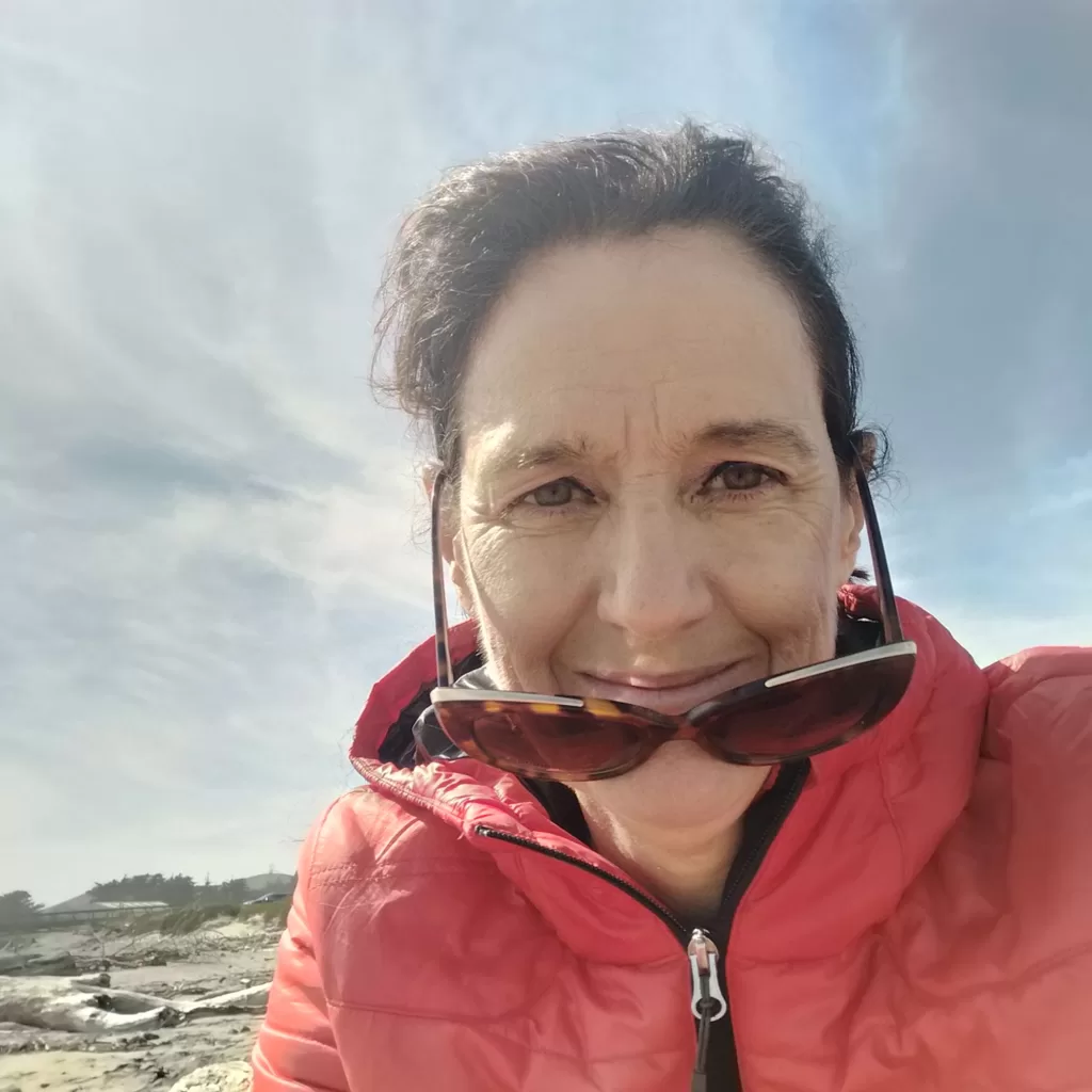 on beach with sunglasses