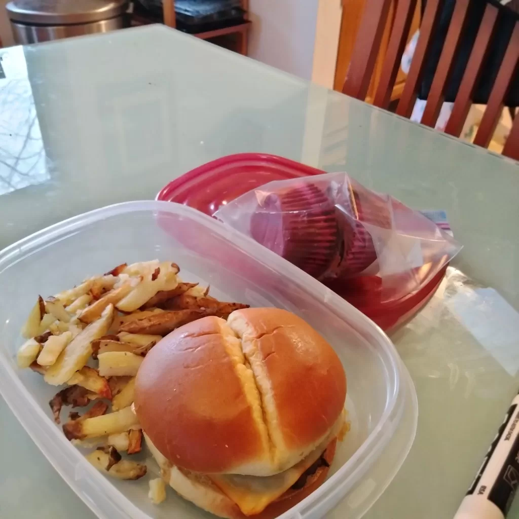 dinner of hamburgers and french fries ready to go home to my son in law