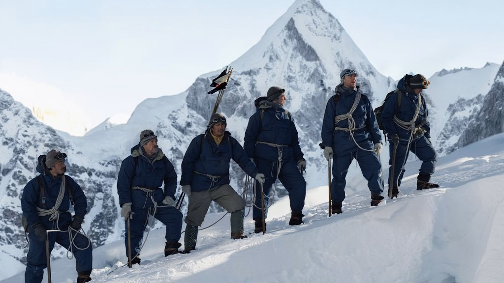Tenzing, (Genden Phuntsok) at middle holding flags